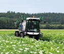 Machine ploughing a field. 